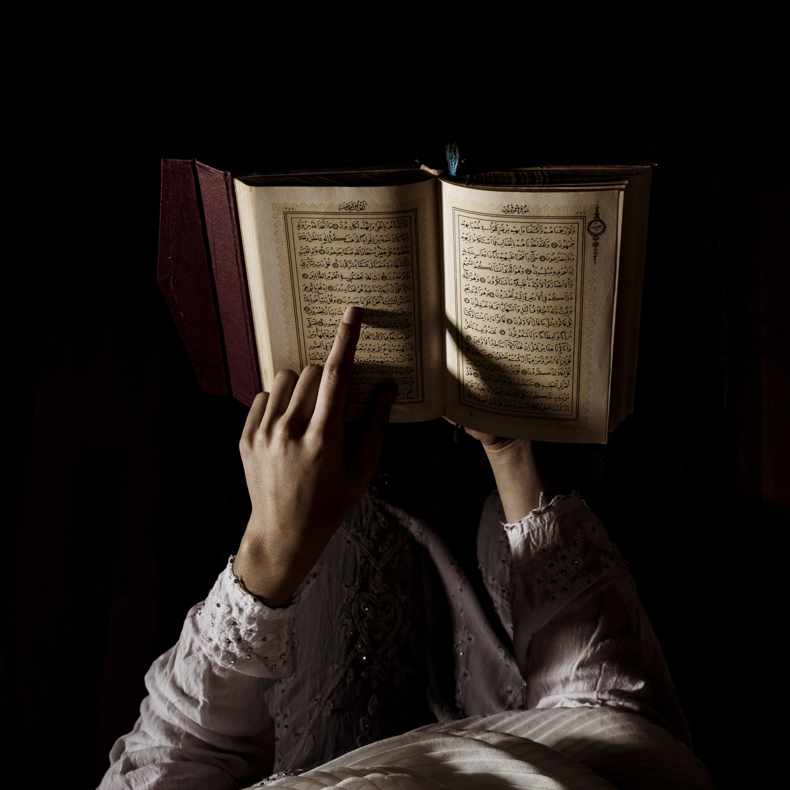 silhouette woman reading quran scaled